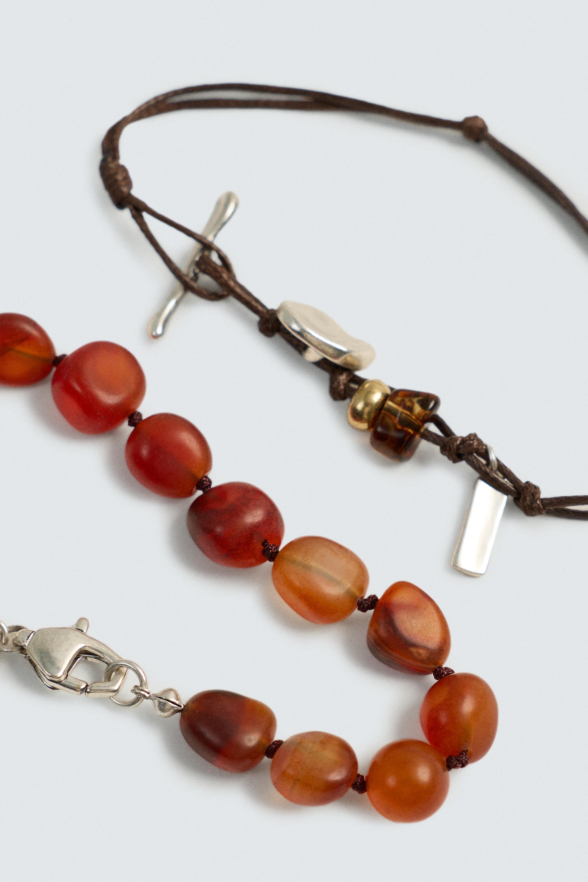 LOT DE 2 BRACELETS ASSORTIS